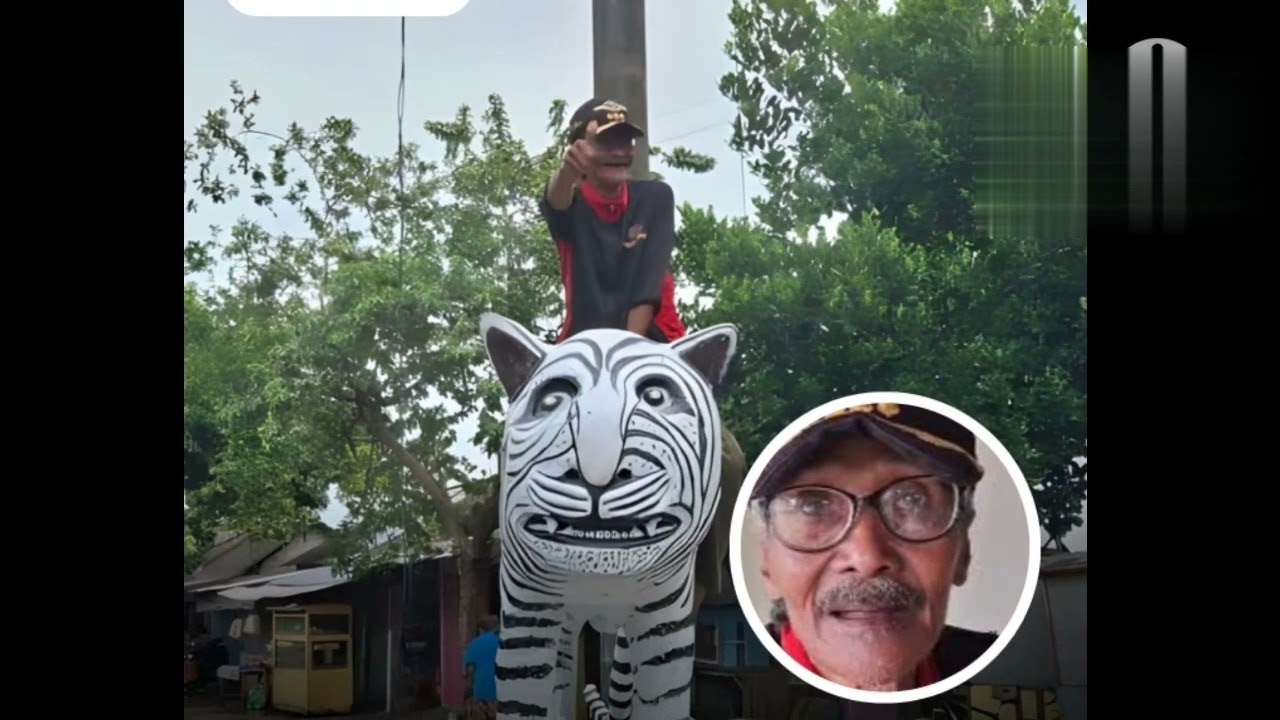 Kades Bangun Patung Macan Putih Biaya Sendiri