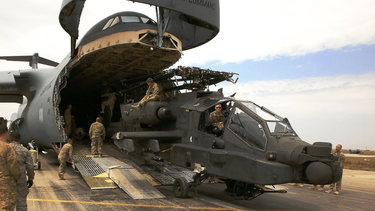 Largest US Military Aircraft Delivers Apache Attack Helicopters