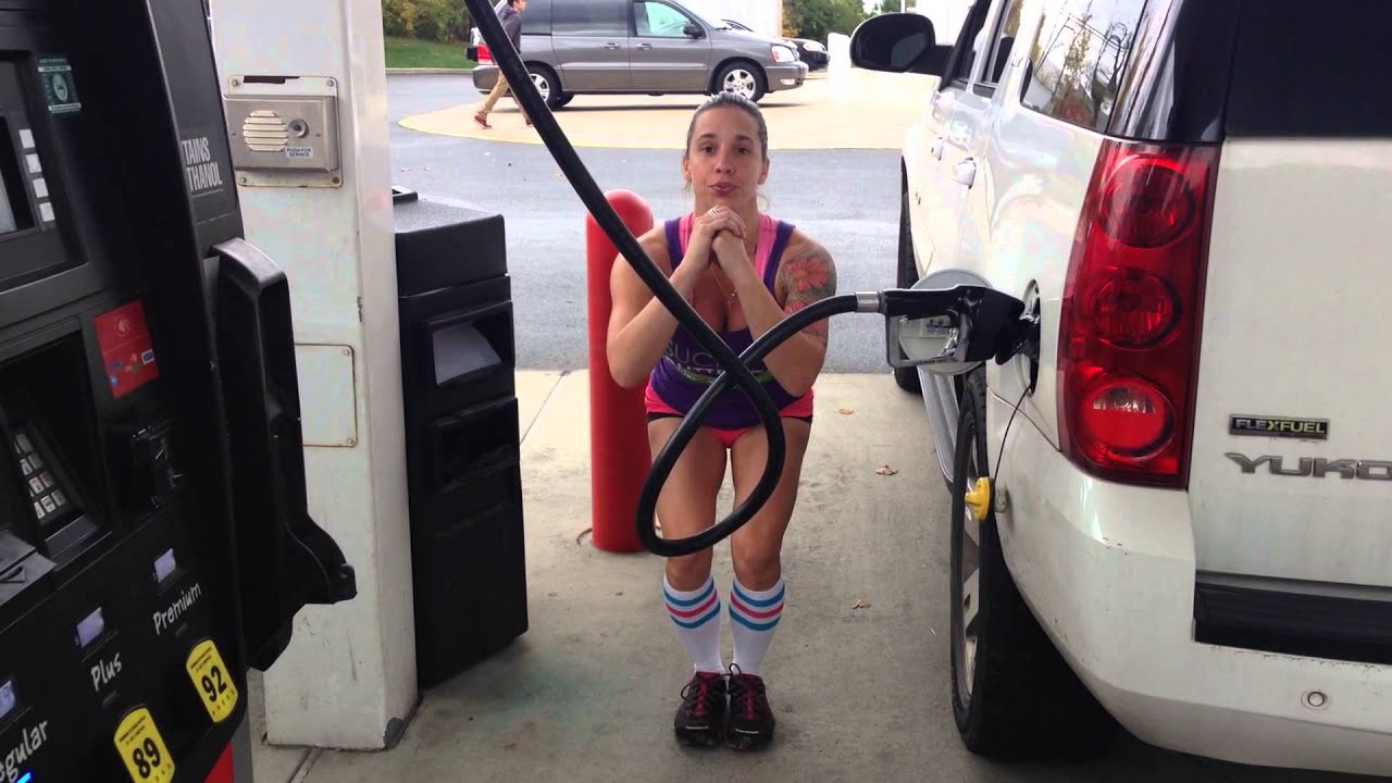 Pumping Some Iron while Pumping Some Gas!!! Train Like A Girl To Go!!