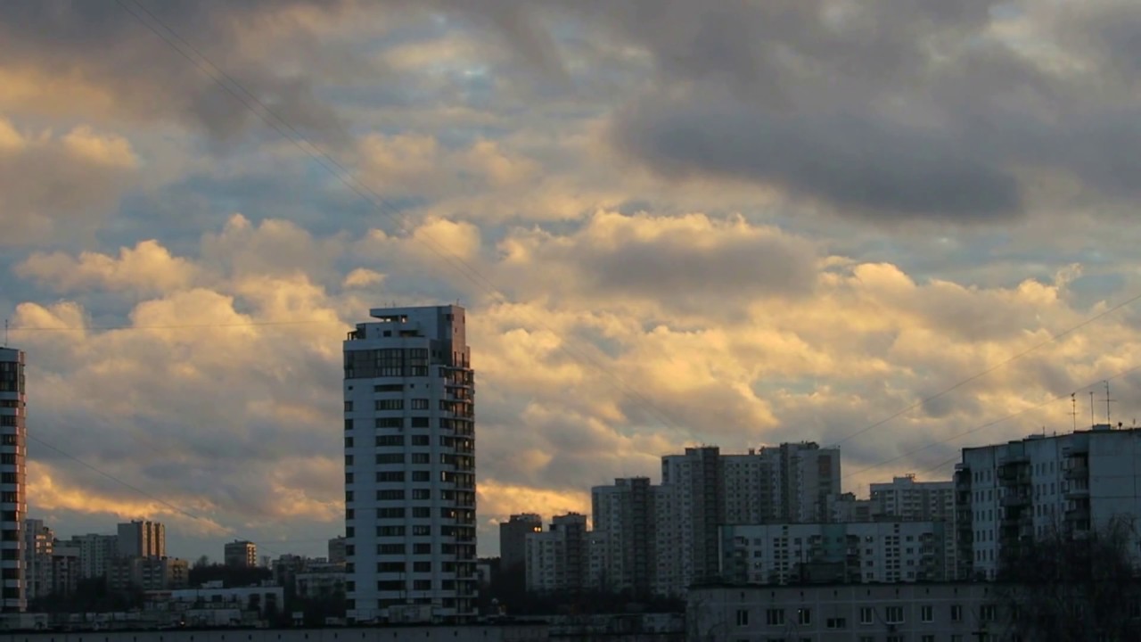 Running clouds at sunset