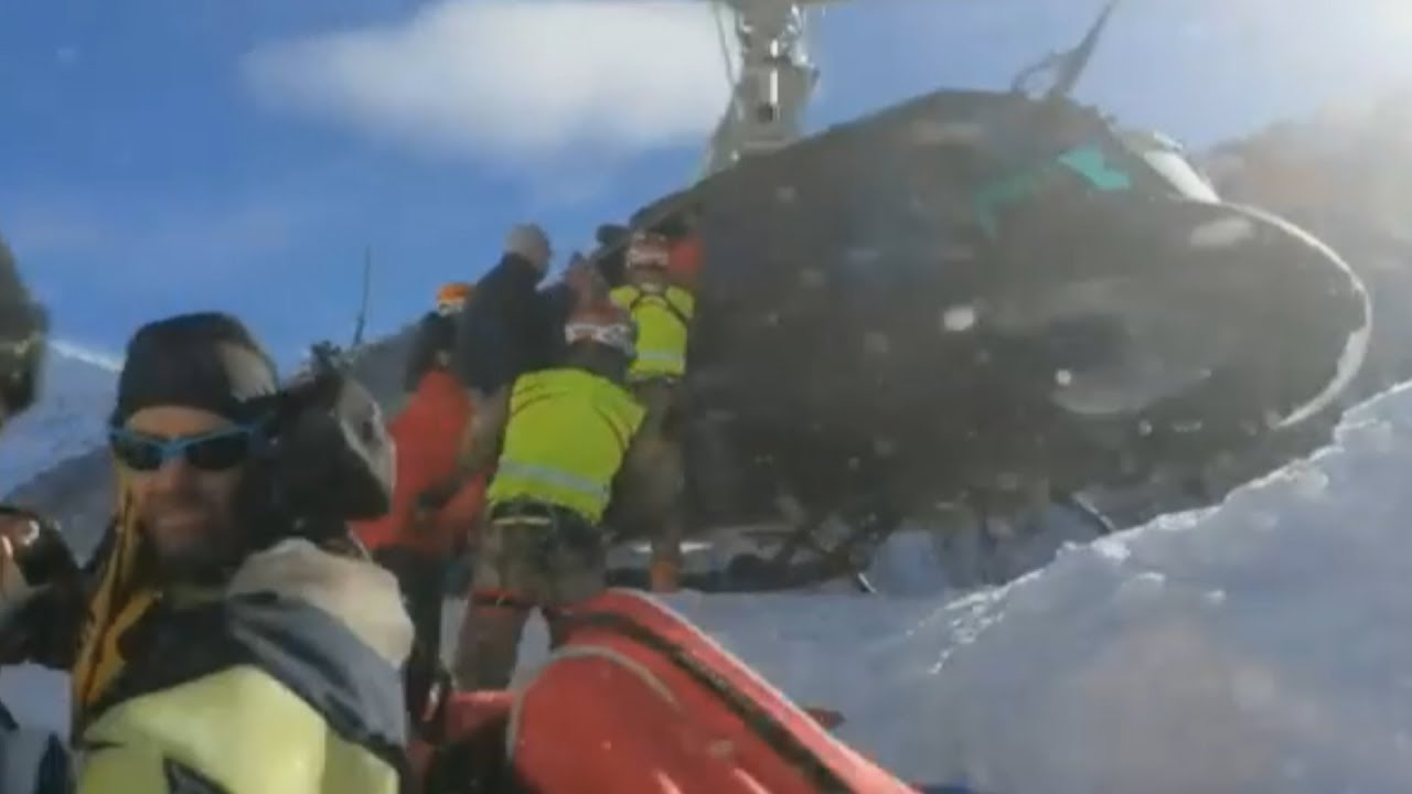 Italian army helicopters rescue tourists as avalanche threat looms