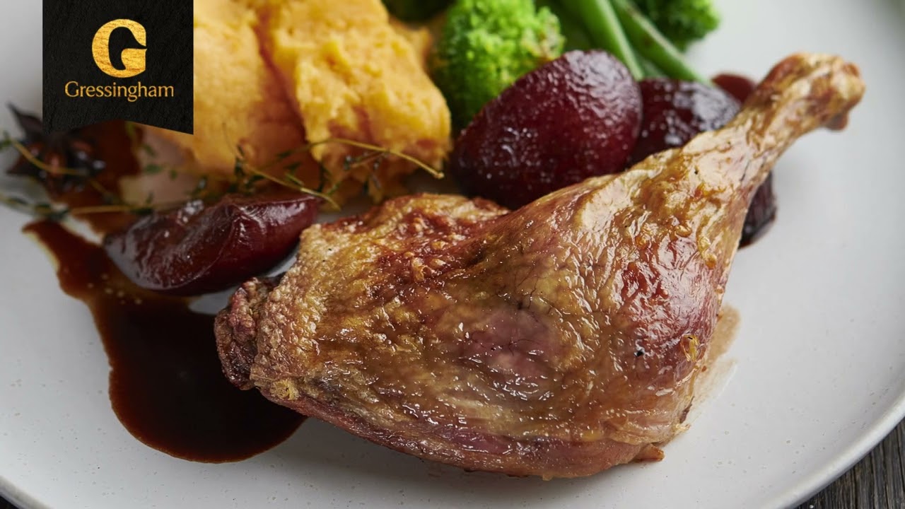 Delicious duck leg with sticky plum sauce