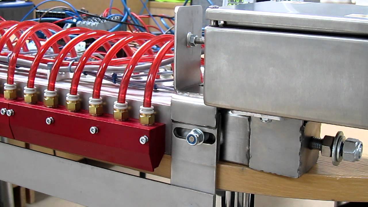 Vision Controlled Reject Nozzle Positioning System