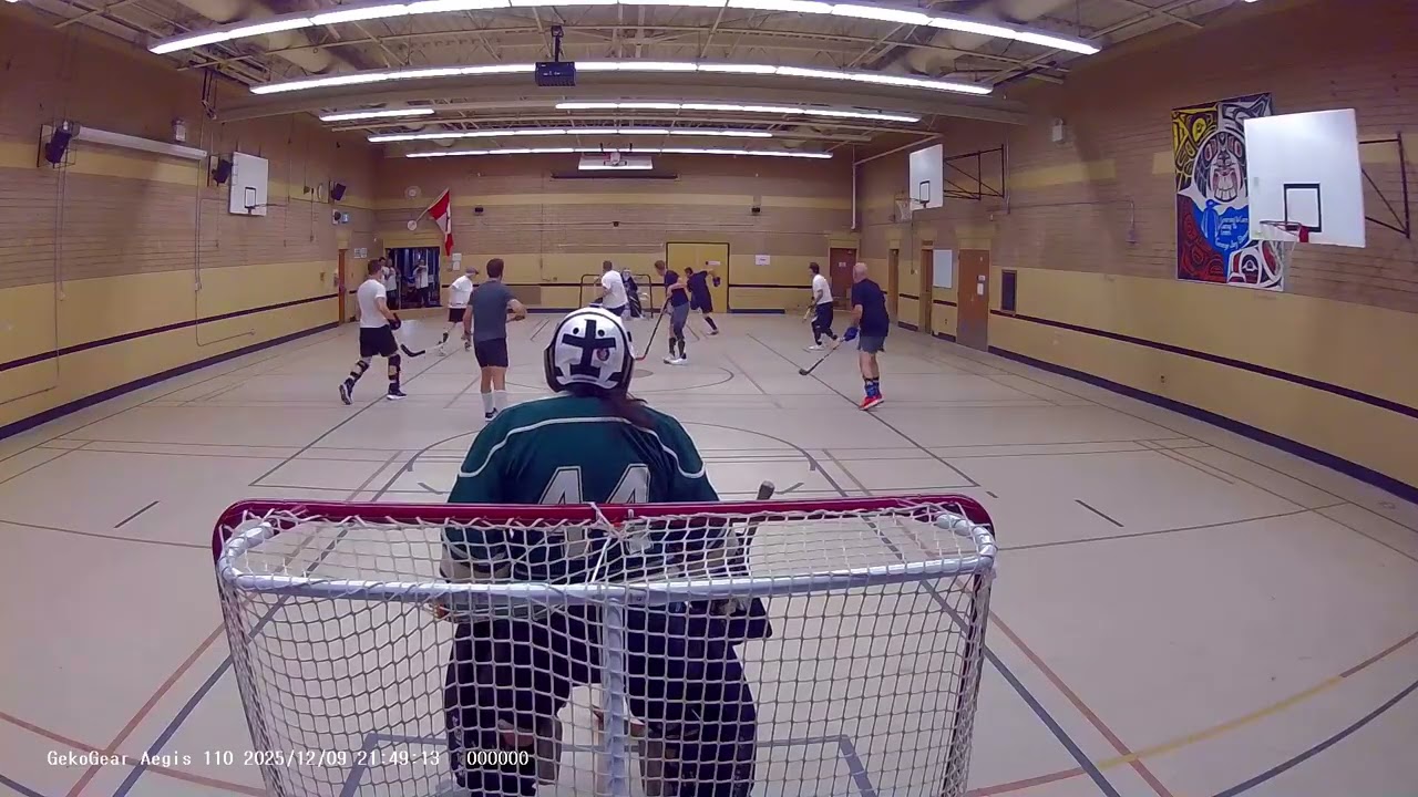 video - Tuesday night ball hockey - net view Roger - 9 Dec 2025