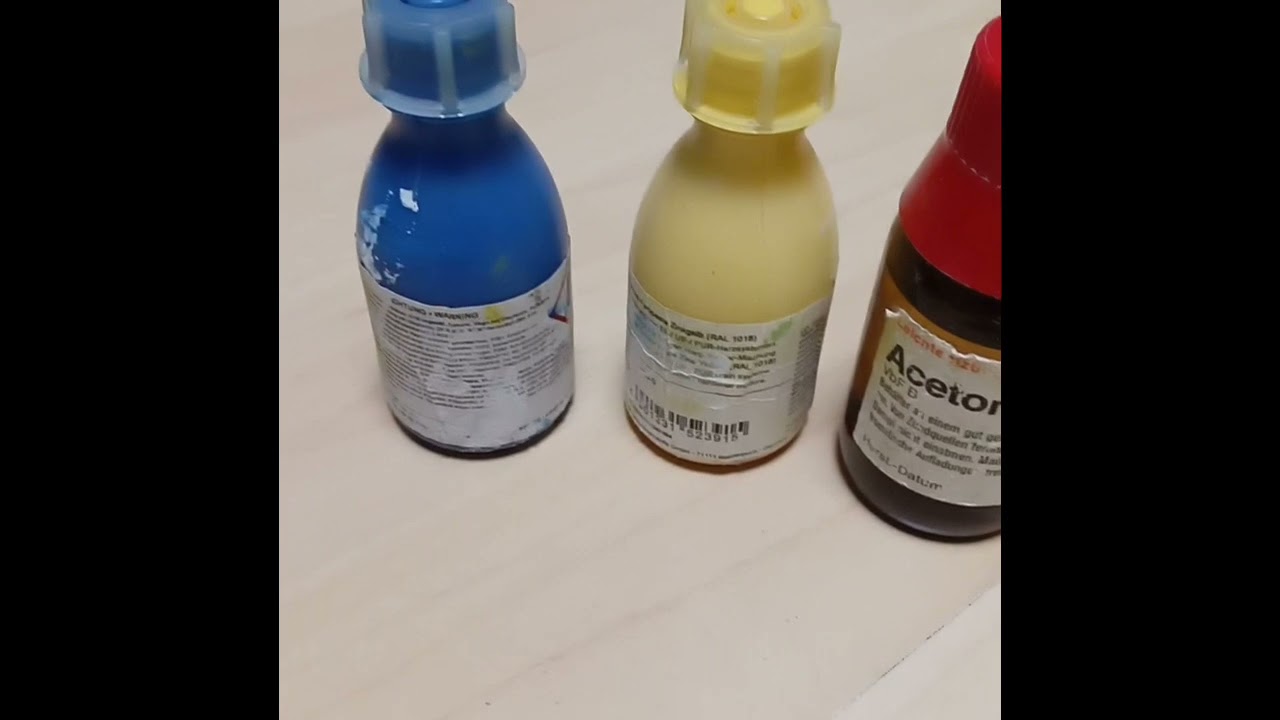 Windsurf fin tip repair with coloured epoxy and a book