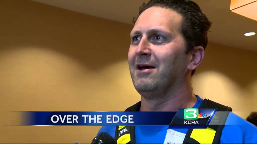 KCRA&rsquo;s Brian Hickey rappels down the Marriot Residence Inn