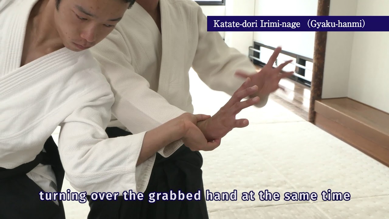 片手取り入身投げ 逆半身　Katate-dori Irimi-nage Gyak-hanmi   Mitsuteru Ueshiba Director the Hombu Dojo Aikido