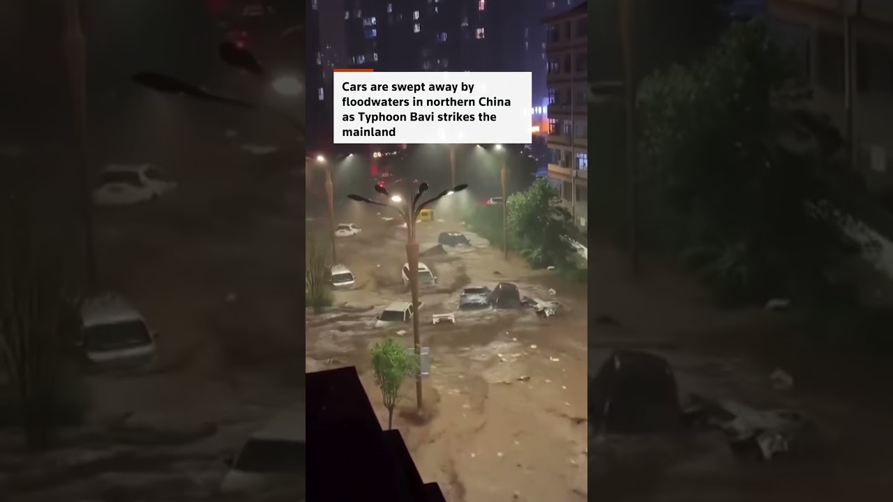 Floodwaters carry vehicles away in China