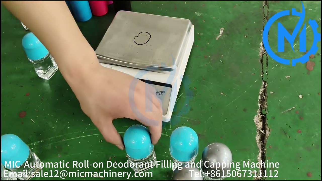 Automatic roll-on deodorant bottle filling stoppering and capping machine