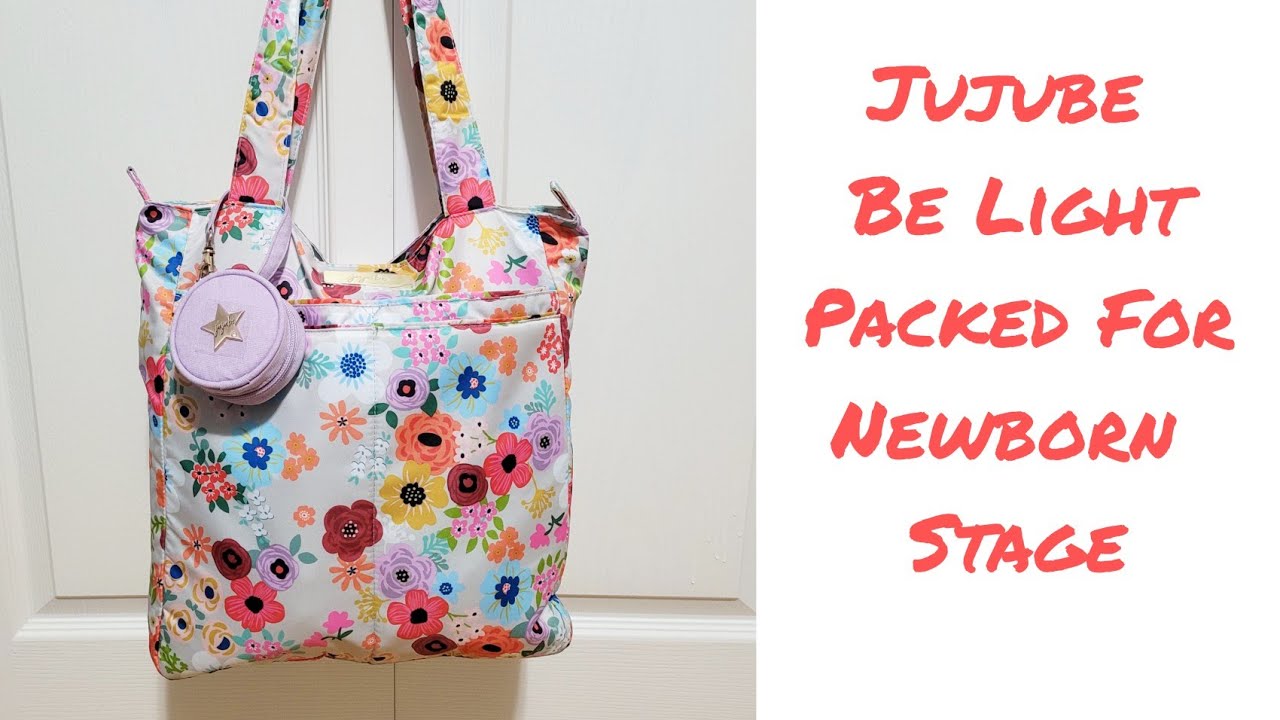Jujube Be Light packed as a diaper bag for a newborn baby
