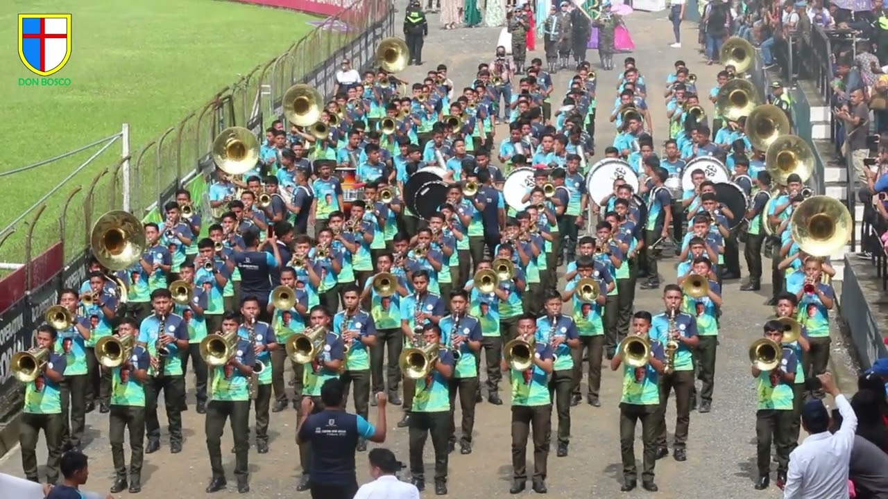 NUESTRAS 3 BANDAS DESFILANDO JUNTOS EN LA FERIA DE COBAN, EN SU HONOR A SANTO DOMINGO DE GUZMAN.
