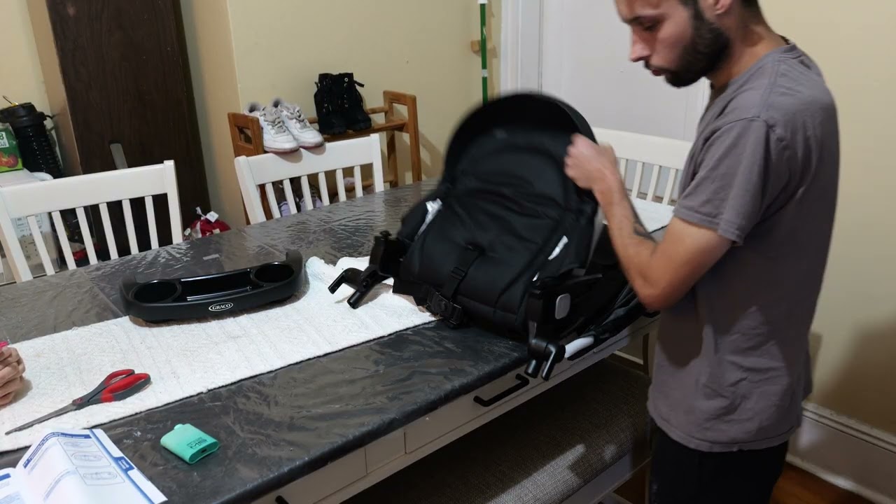 Putting together The Graco 3 in 1 Modes Element Travel System Assembly