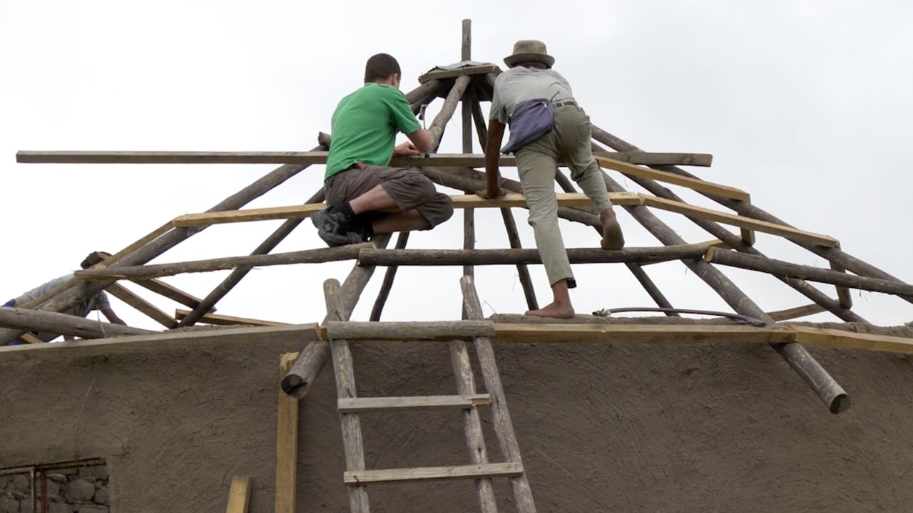 Helping to build a roof on a Xhosa house Vlog 7