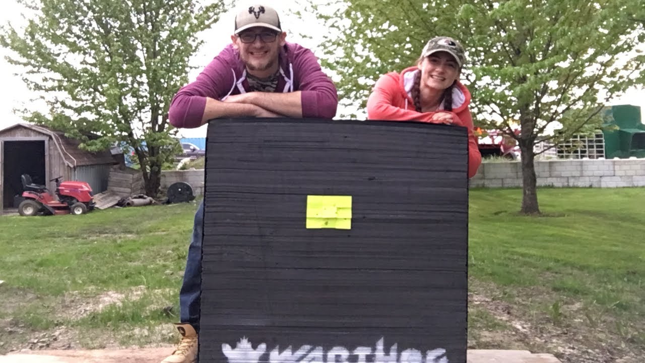 We bought a HUGE archery target! Sighting in our compound bows!