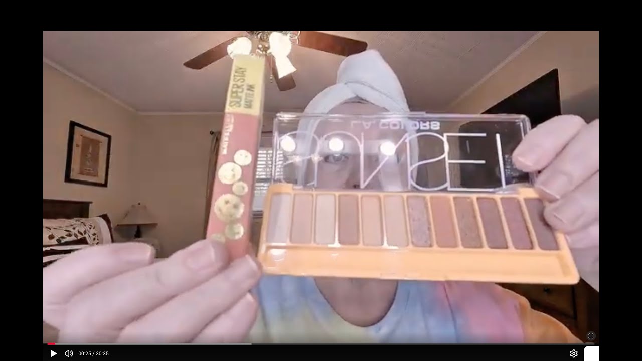 Is this lady really using ORANGE makeup?