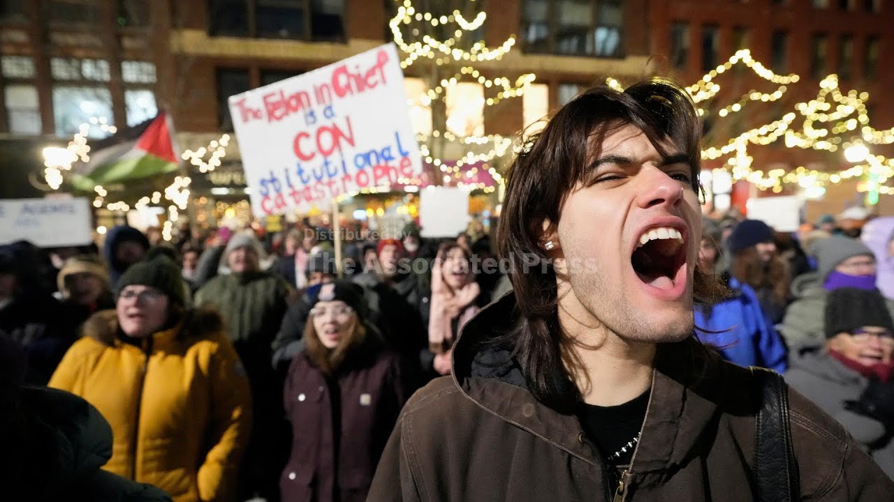 Protesters rally in Portland demanding 'ICE out of Maine'
