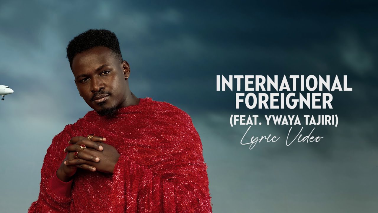 Okello Max - International Foreigner ft. Ywaya Tajiri (Official Lyric Video)