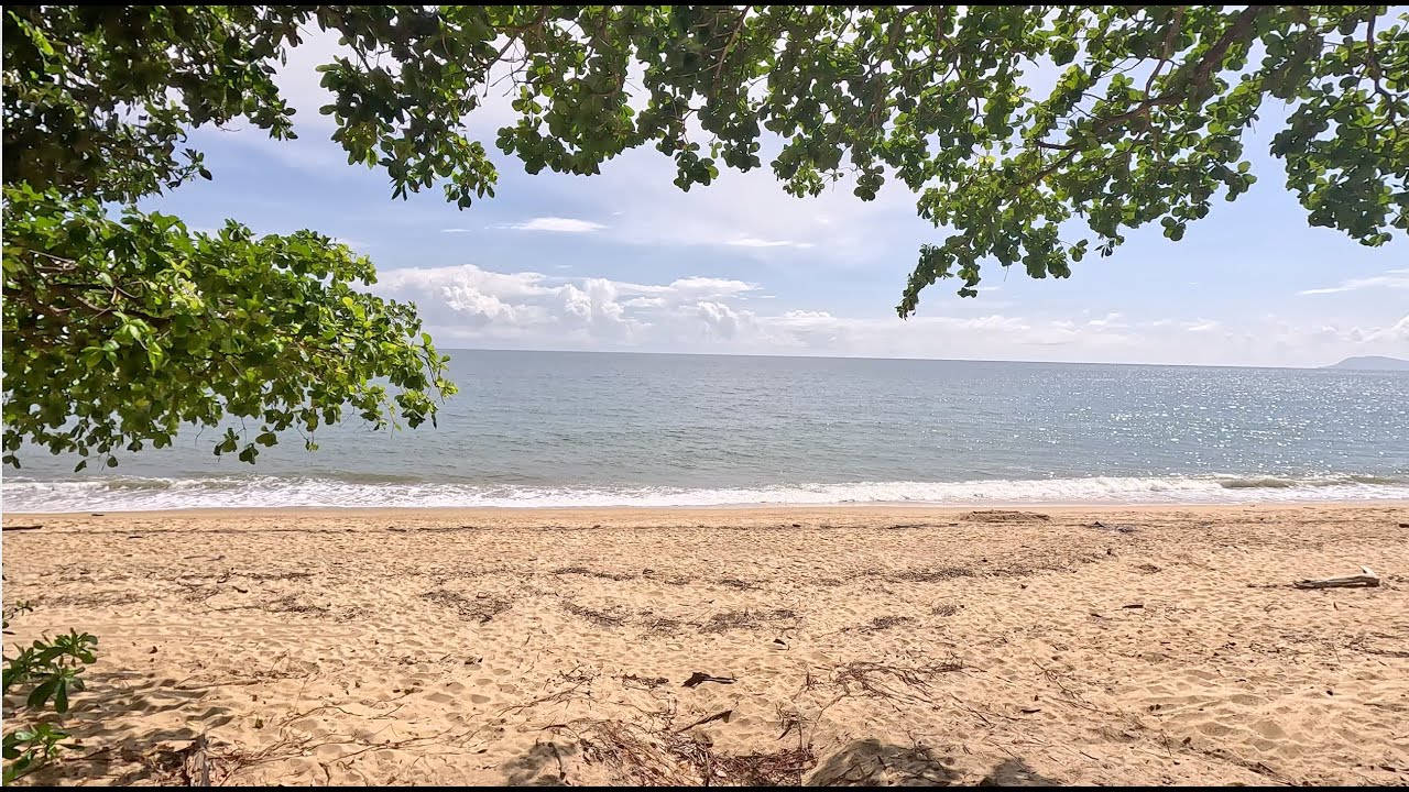 Walk on Trinity Beach Cairns Australia