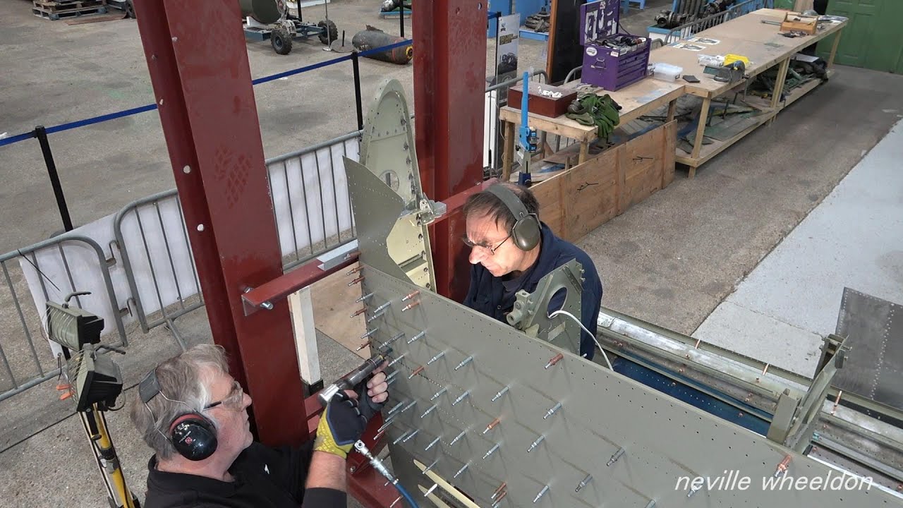 Video 169 Restoration of Lancaster NX611 Year 5. Dave and Norman riveting skins to the fuselage