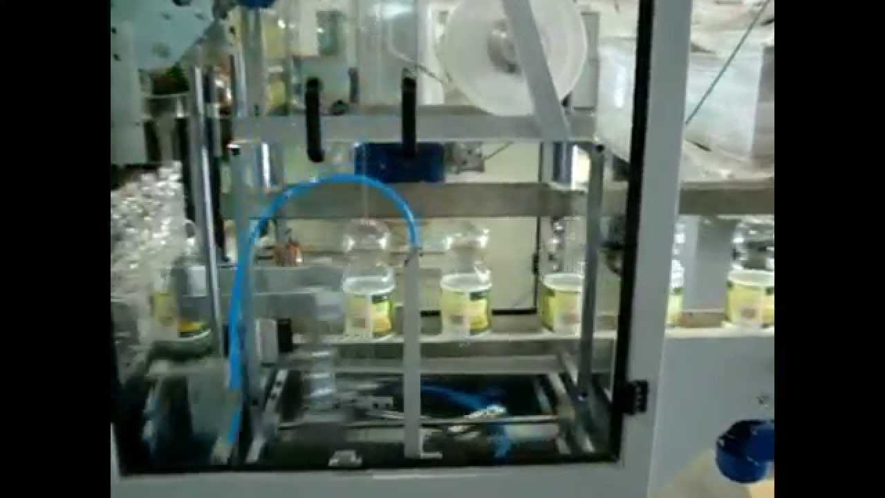 ETIQUETADORA DE BOTELLAS AUTOMATICA LA 60