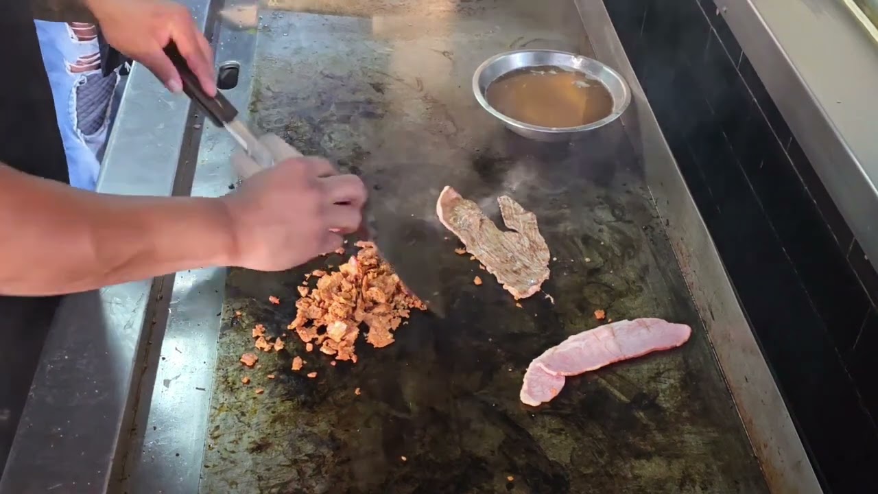 Cooking a Burrito at El Burro De Moctezuma in Moctezuma of Venustiano Carranza in Mexico City (CDMX)