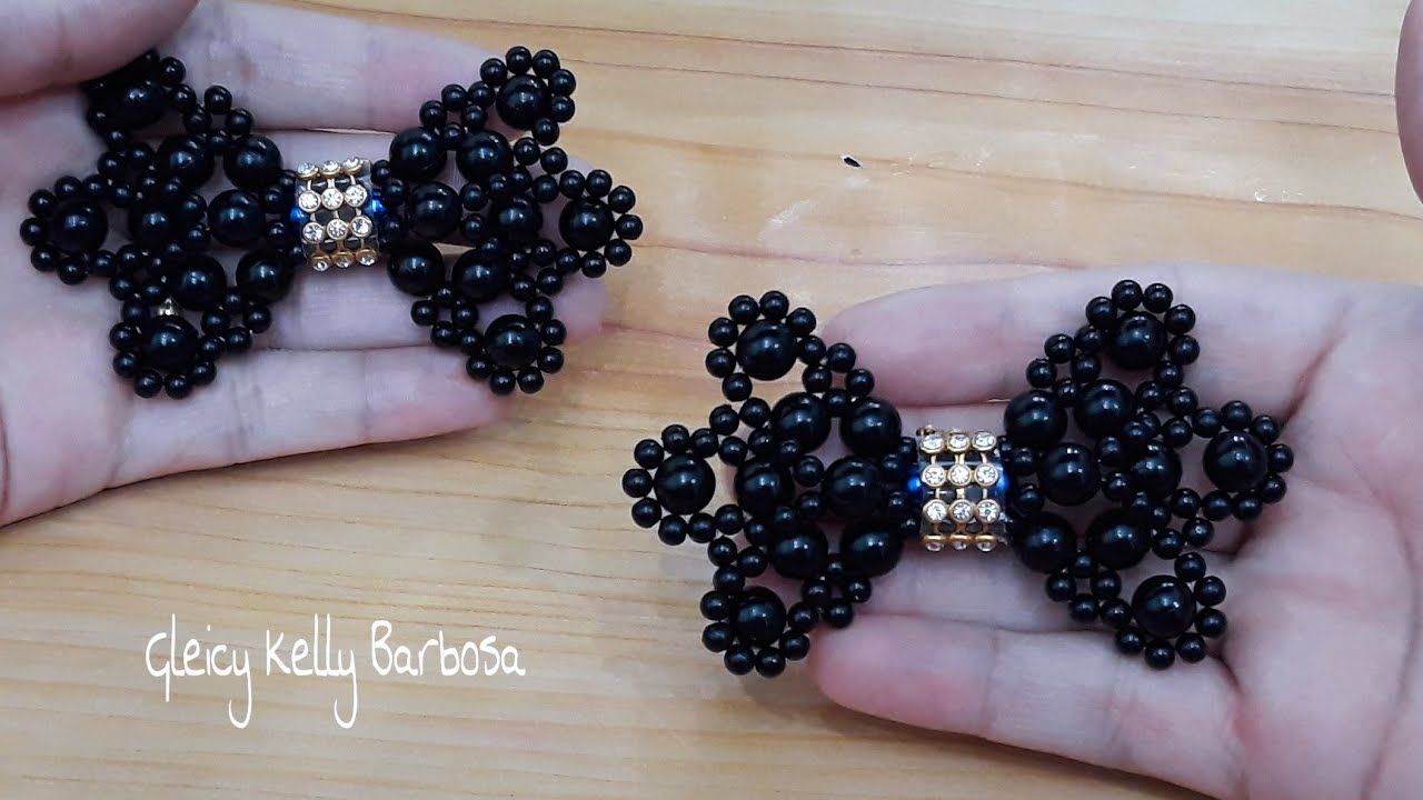 Laço de pérolas preto