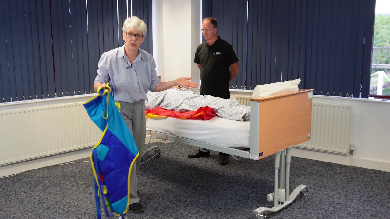Fitting a Sling in Bed Using 2 Flat Slide Sheets