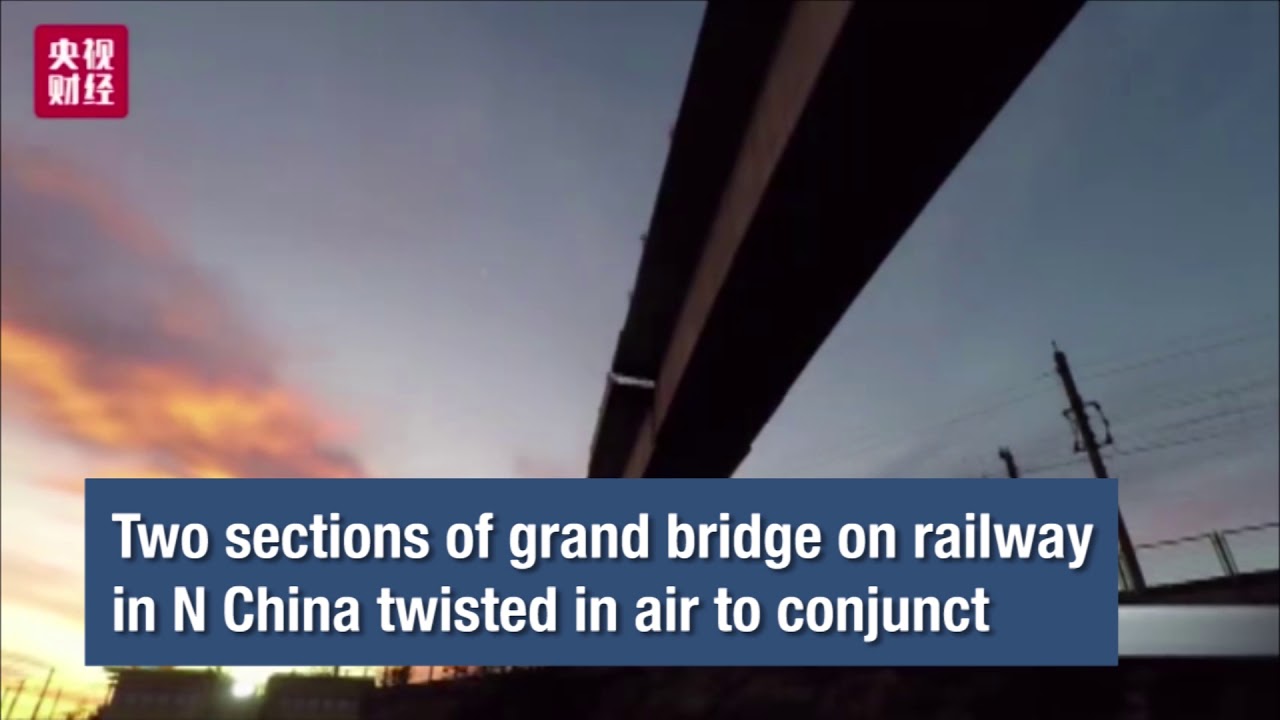 Two sections of grand bridge on railway in N China twisted in air to conjunct