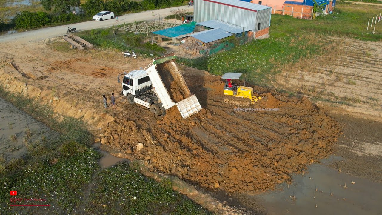 Interesting Bulldozer Skills Operator Moving Mud Filling The Land With Dump Truck Spreading