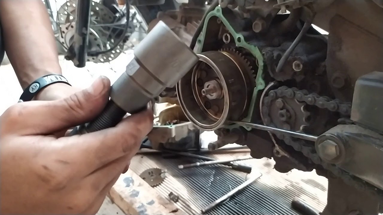 cara melepas magnet honda revo fit fi