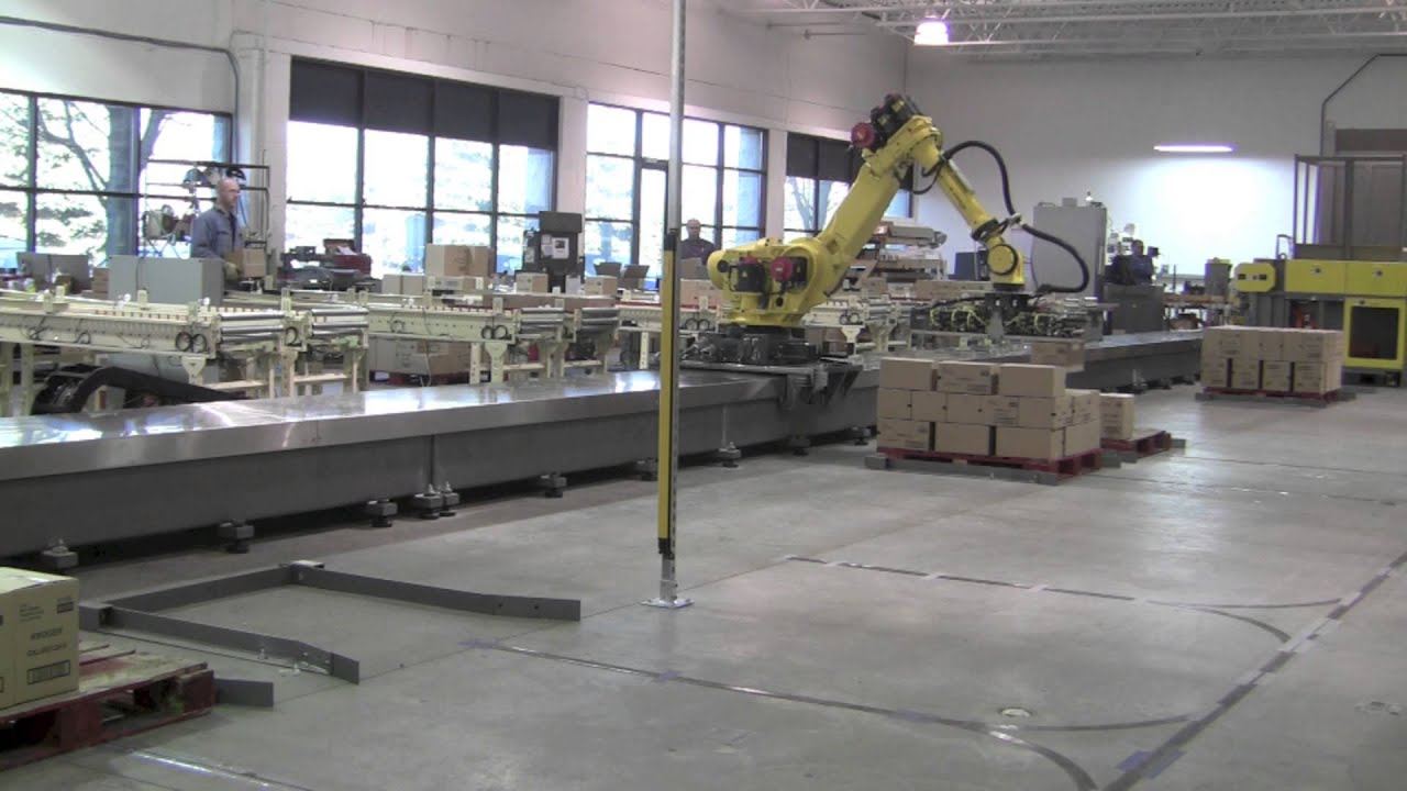 Robotic Palletizing Line with an Automated Guided Vehicle (AGV)