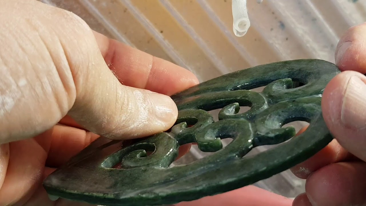 Carving Curves in Pounamu with a Diamond Cone Dremel Burr.