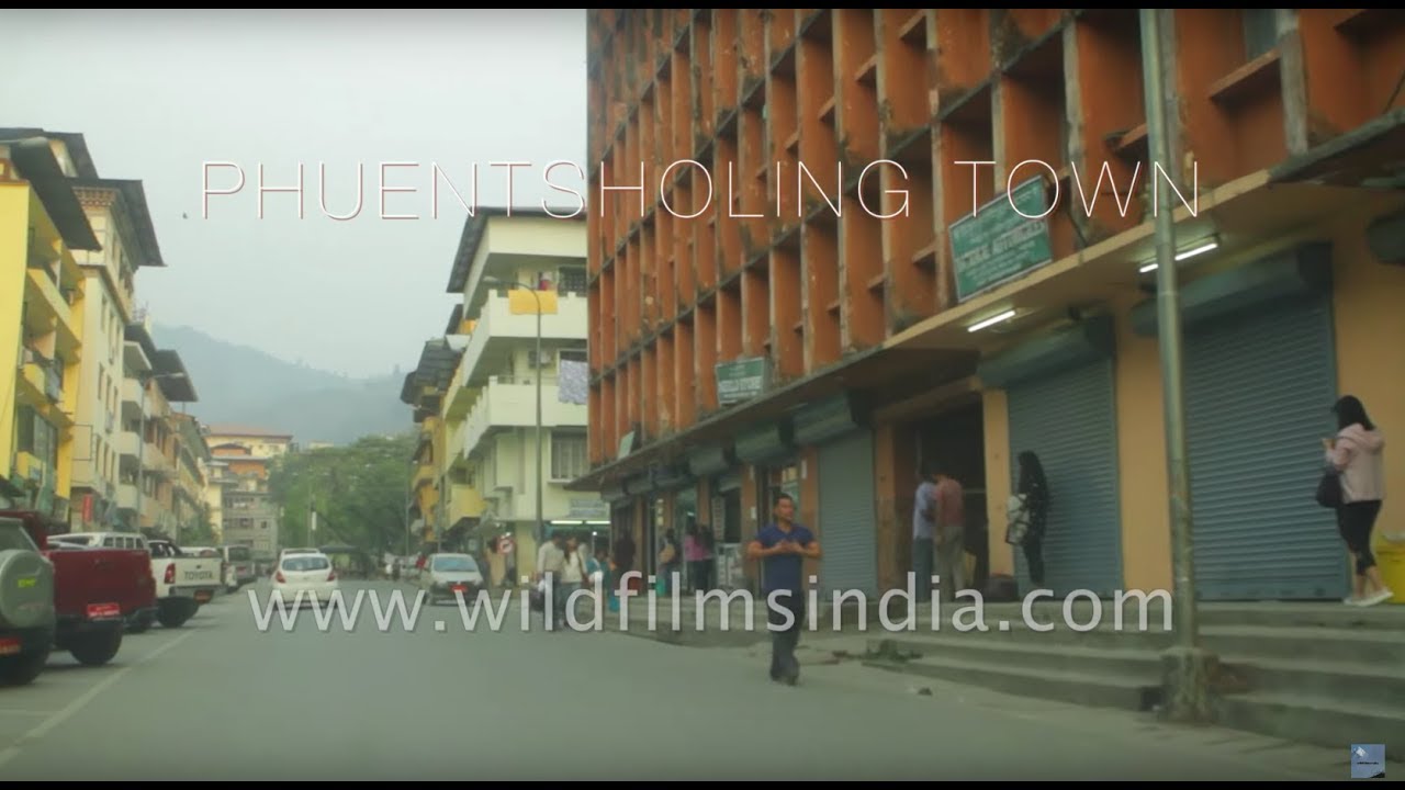 Aerial view of and driving around Phuentsholing town in Bhutan