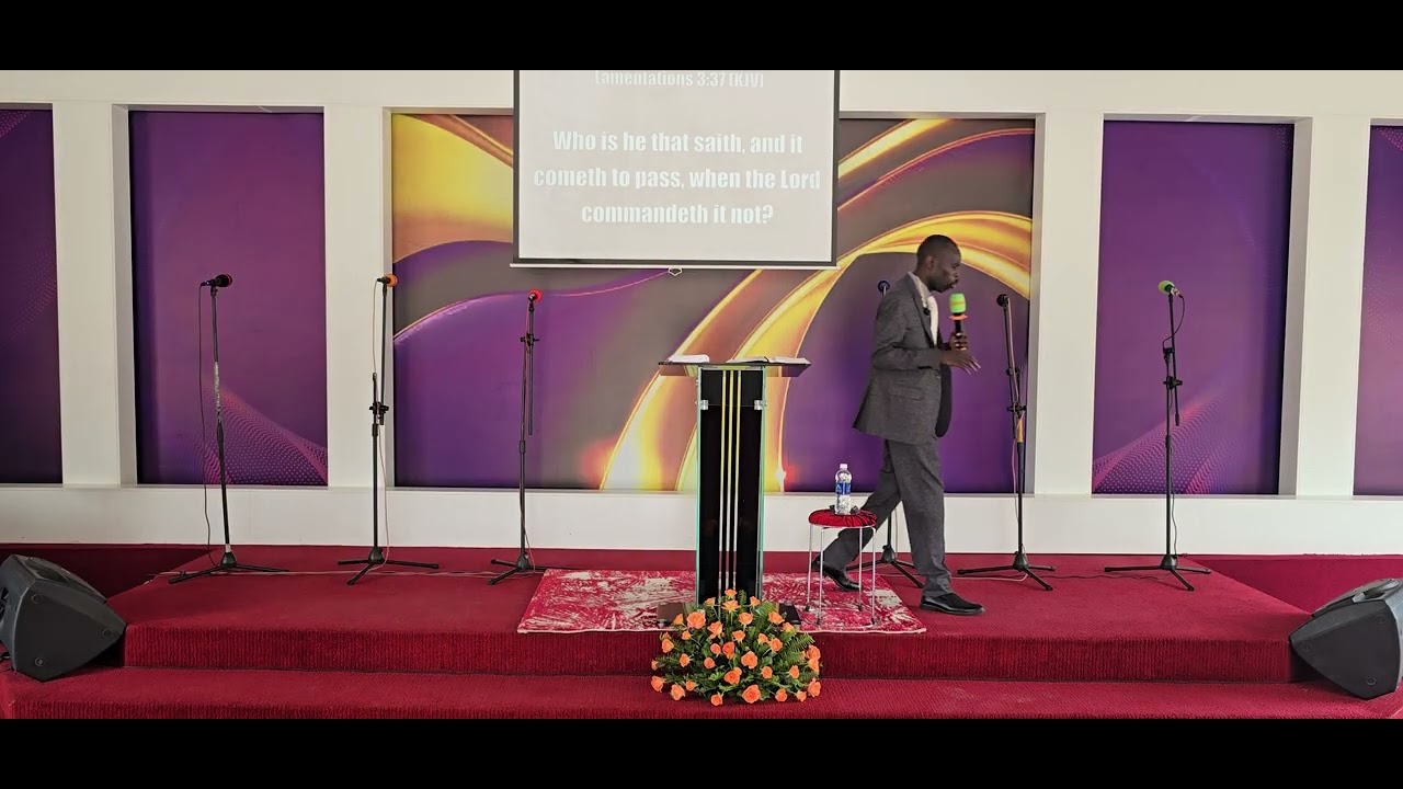 Bishop Jacob Banda teaching on a message titled God is in control at Victory Centre Church.
