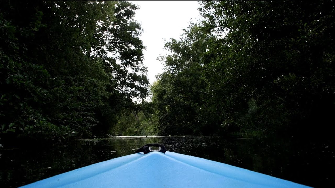 Relaxing River Kayaking Trip. Cambridge Kayaks Pioneer Canoe