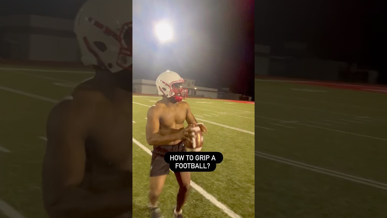 How to hold a football? #nfl #ncaa #madden #quarterback #sports #training #cfb #d1 #elite #workout