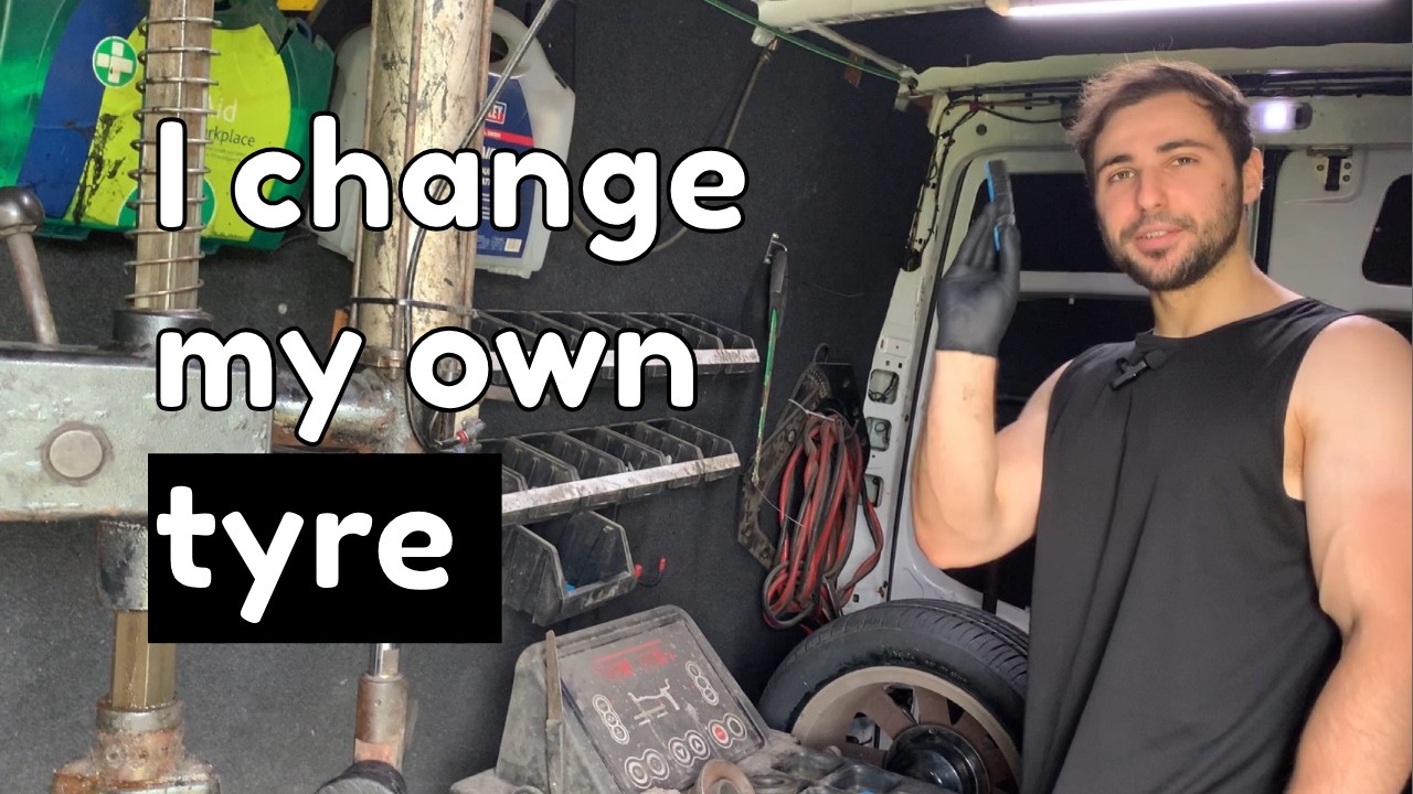 Professional Tyre Fitter helps me change a flat Tyre (How to change a car Tyre)