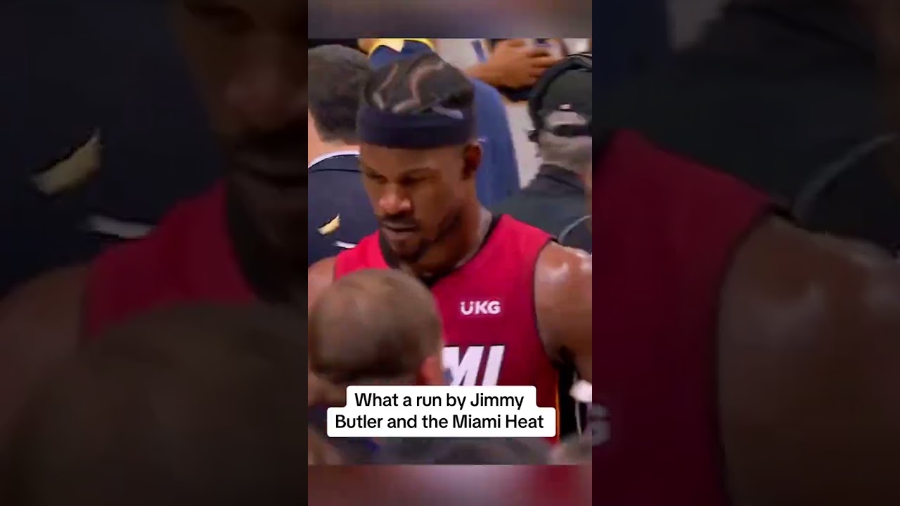 Jimmy Butler & the Miami Heat exit the court after their 2023 NBA Finals defeat
