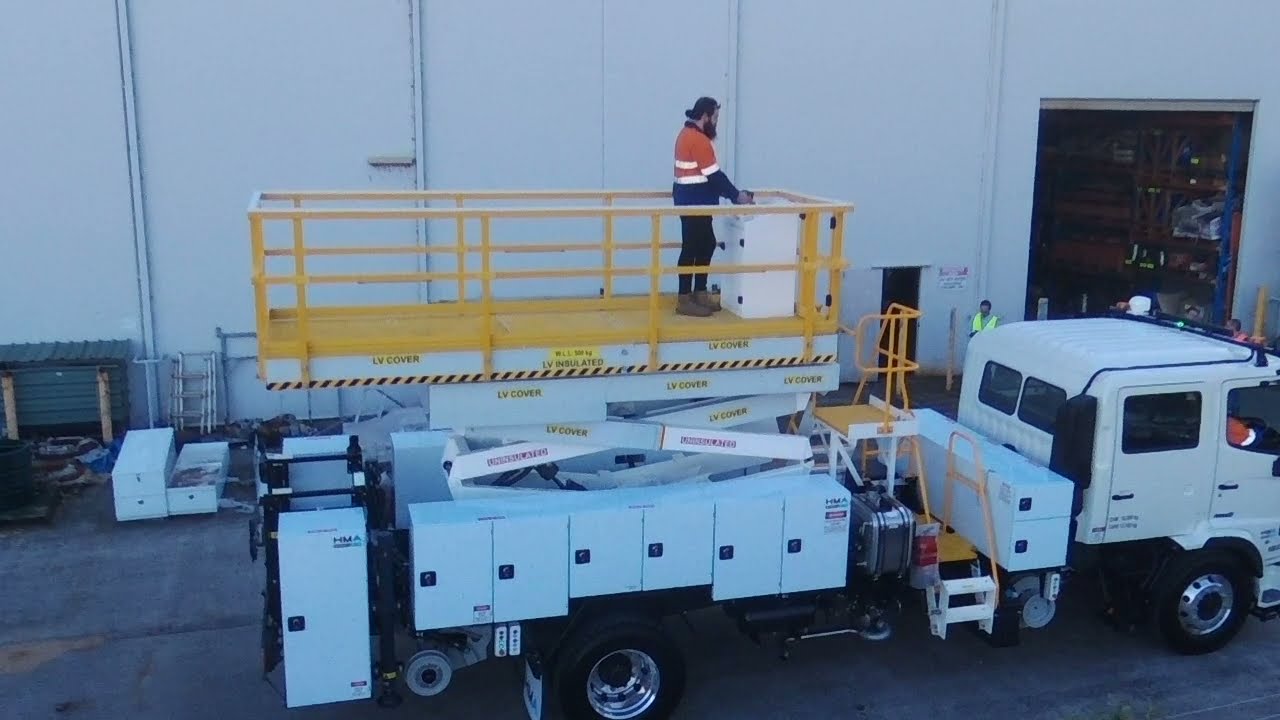 HMA Road Rail Vehicle with Insulated Elevated Work Platform (EWP)