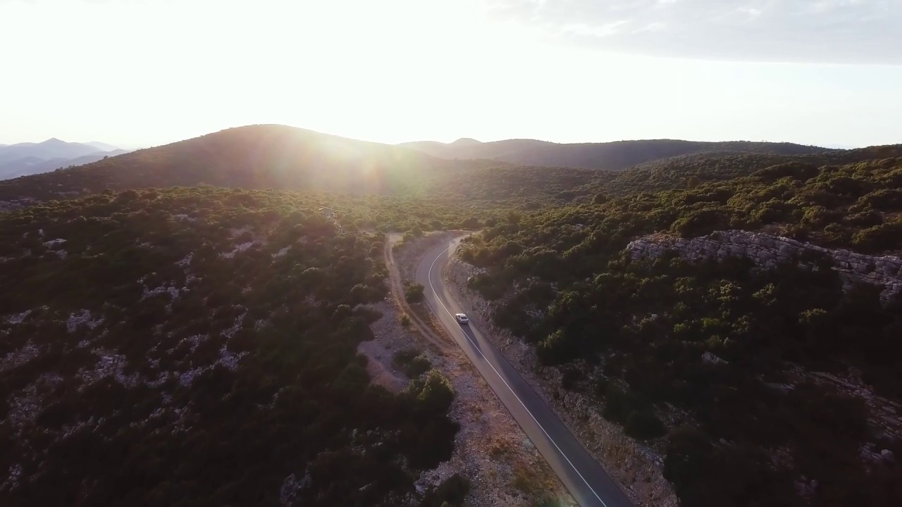 Drone Footage | Aerial Video of Cars on Road in Hilly Forest Area