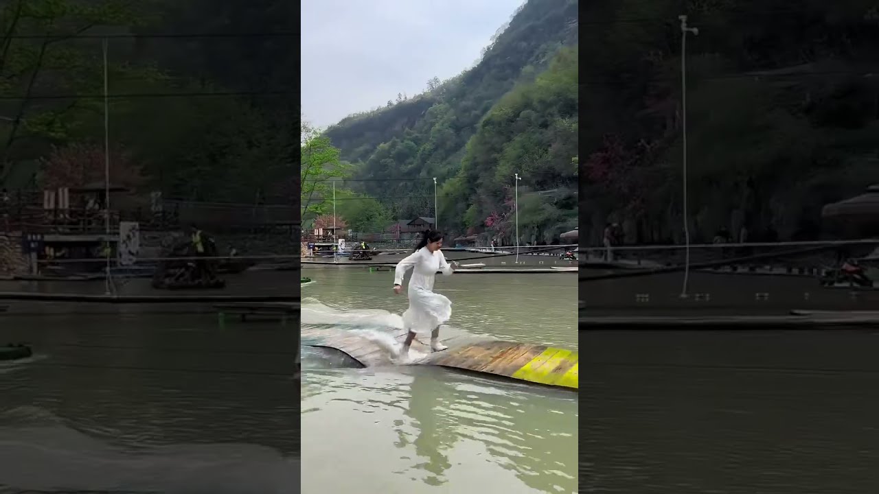 White ankle boots wet when she tumble on floating bridge