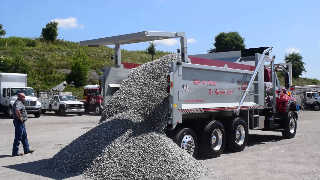 Hill International Trucks with Pik Rite Pusher Body