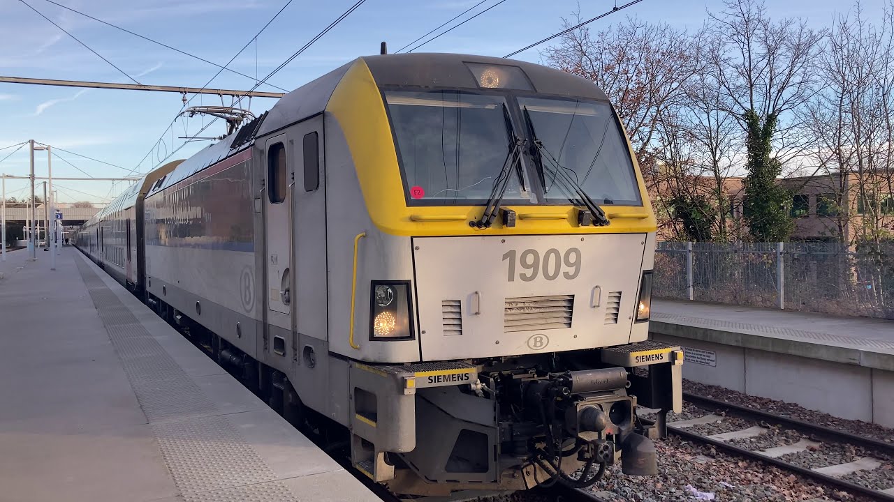 HLE 1909 + M6 + HLE 1910 + M6 vertrekken in Genk