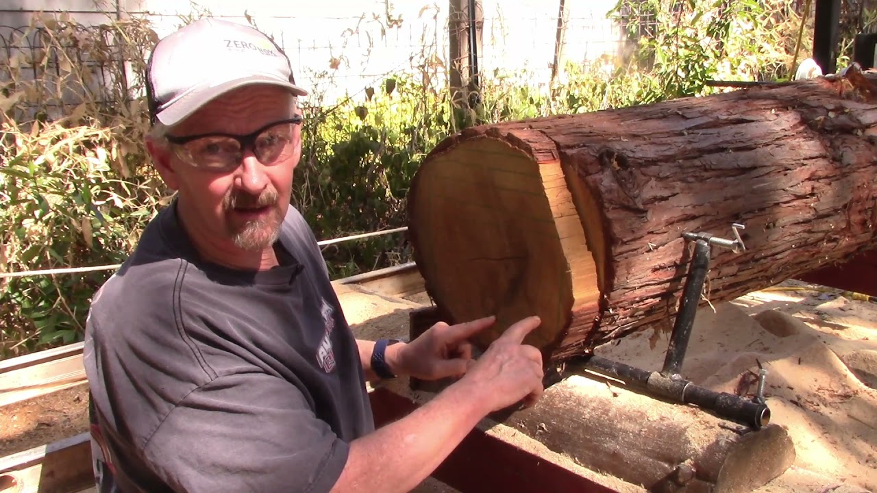Using my $150 dollar homemade electric sawmill to mill beautiful boards in Cedar ridge California.