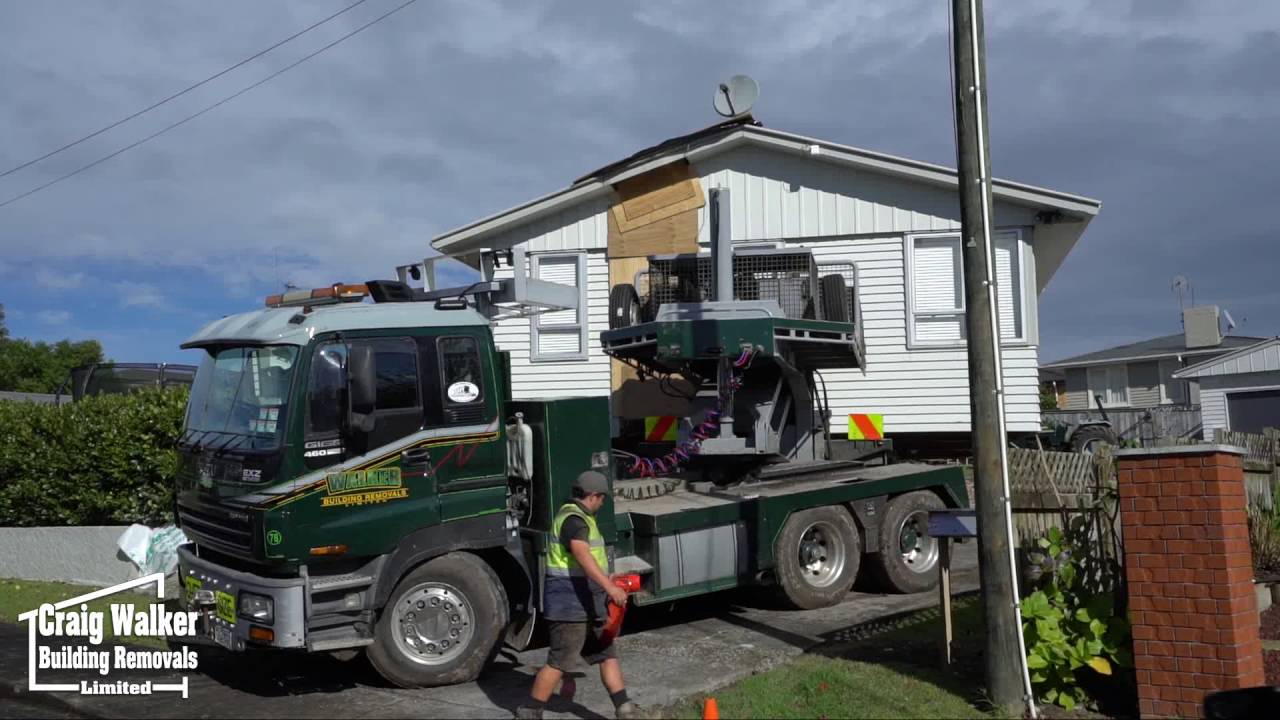 House Lifted onto a Truck