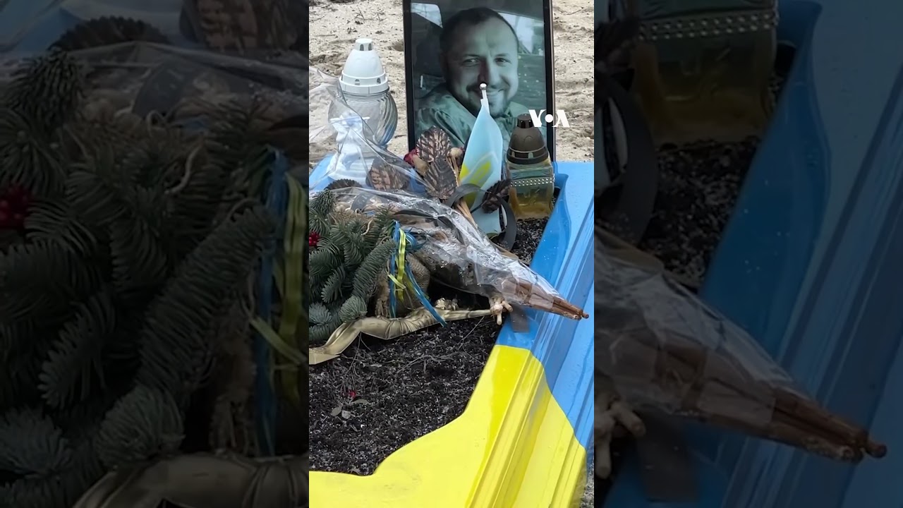 Flowers, Photographs Adorn Cemetery Where Ukrainian Soldiers Are Buried  | VOA News #shorts