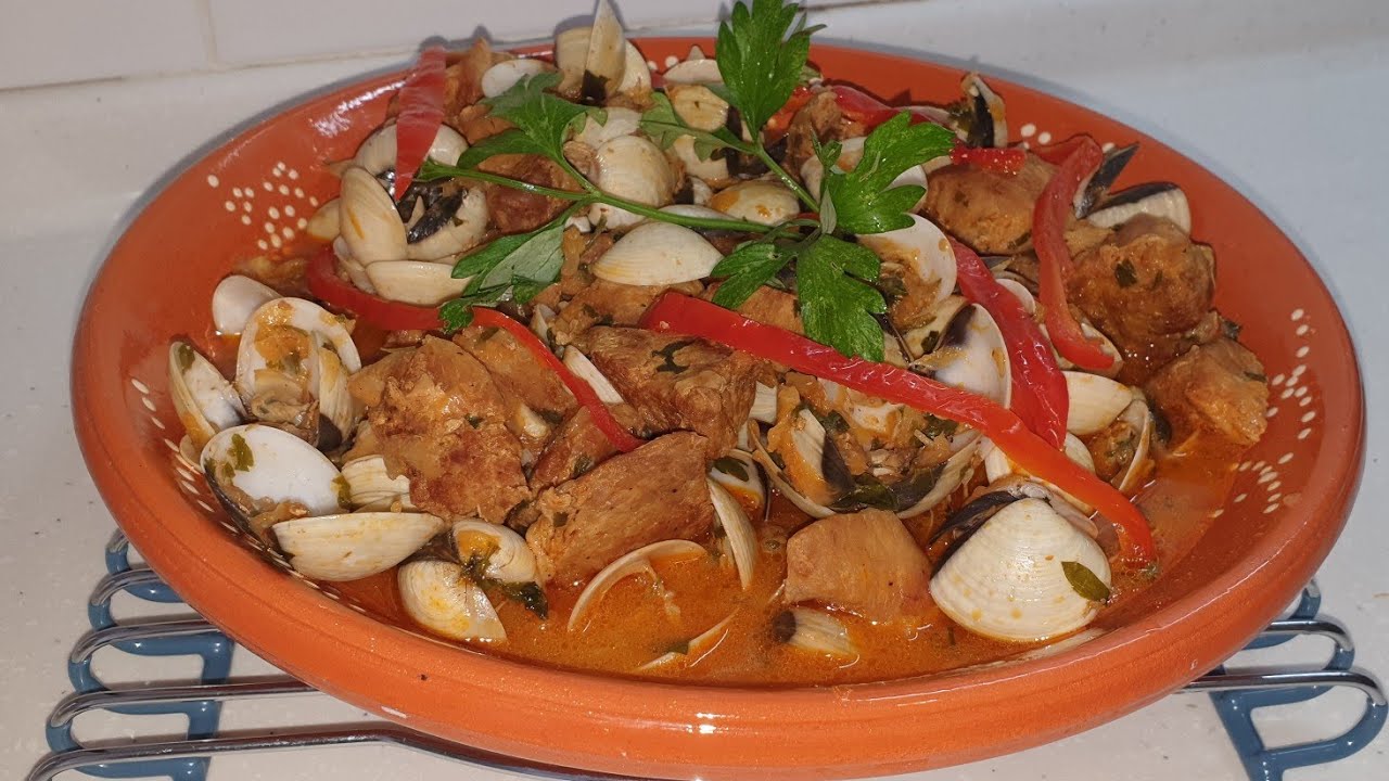 Carne de porco com ameijoas