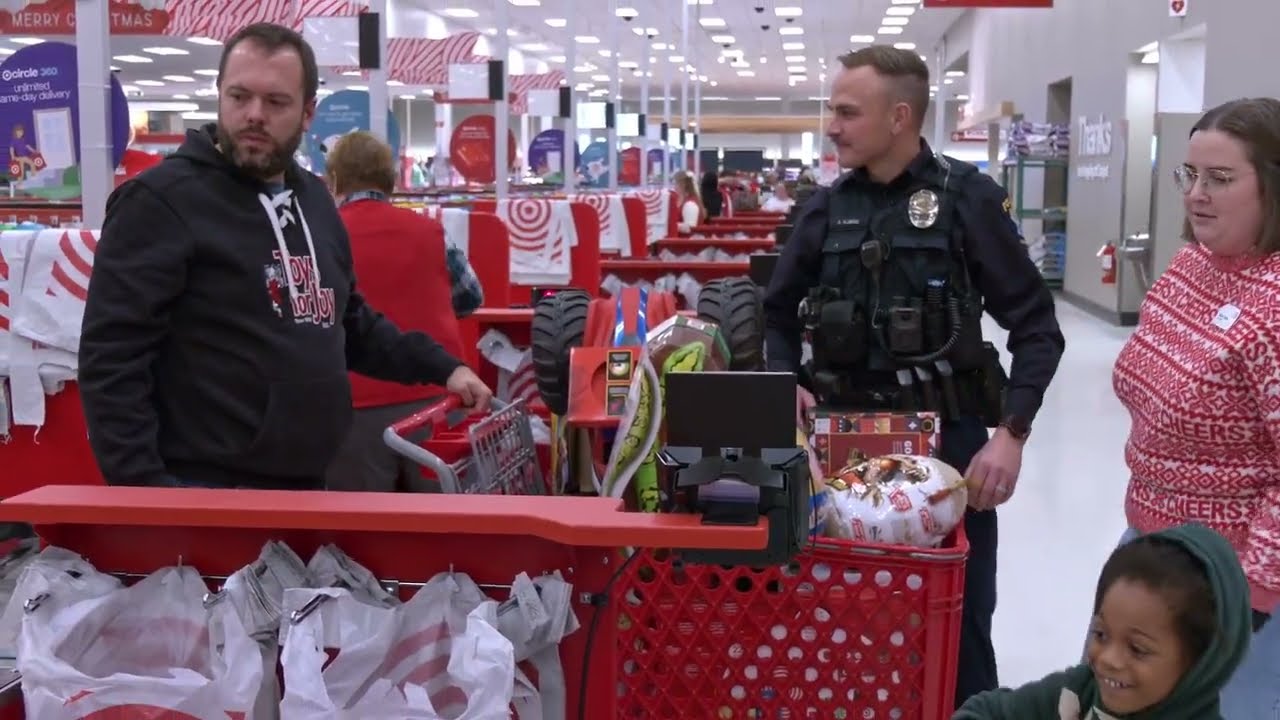 Kids 'Shop with a Cop' for Holiday Gifts