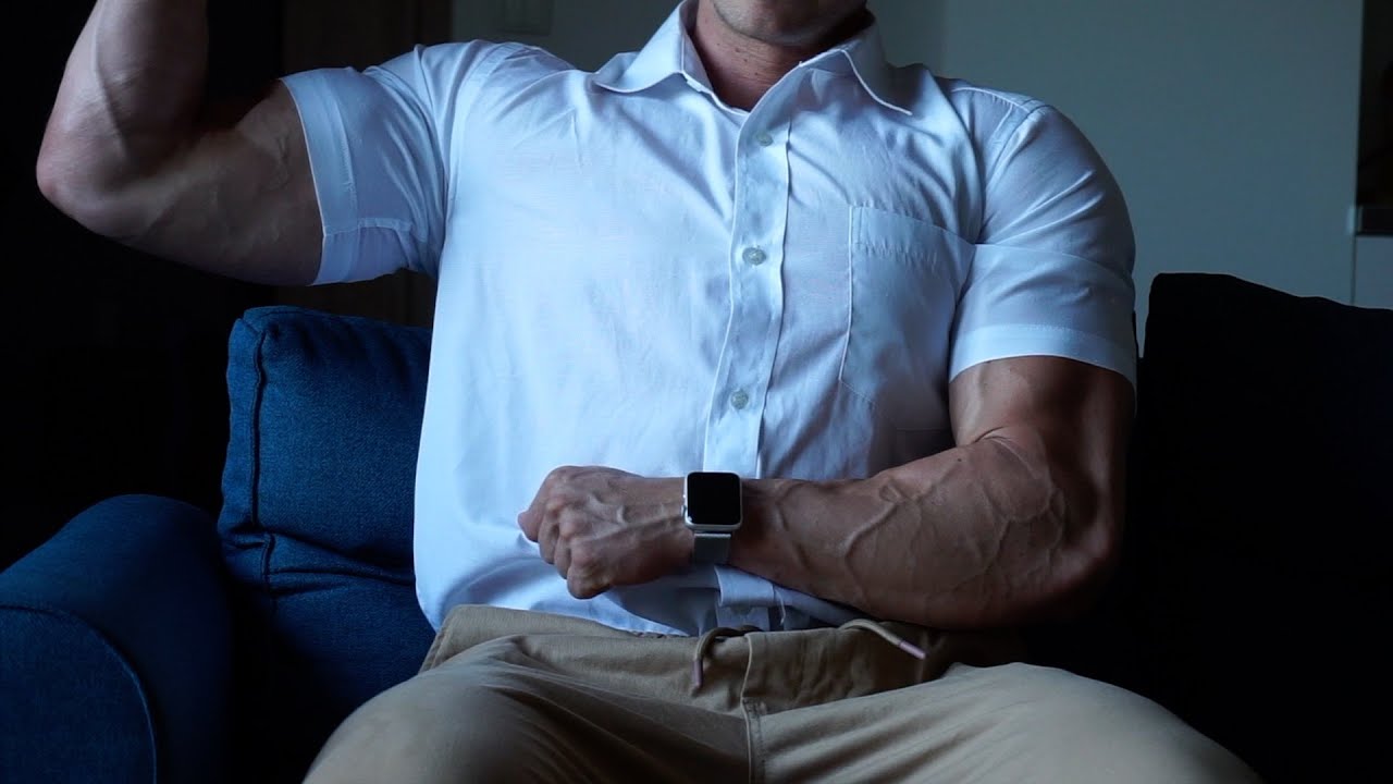 PUMPED MUSCLES IN A SHIRT