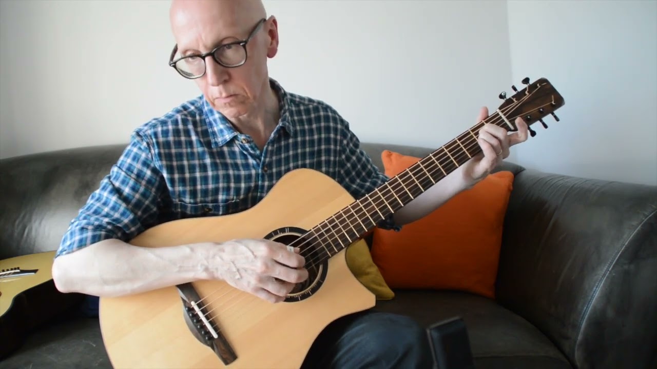 Taran Tirga Mhor and Marchwood OM steel string guitars